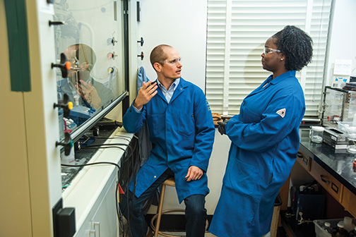 Photo of UC Davis chemist with student in lab