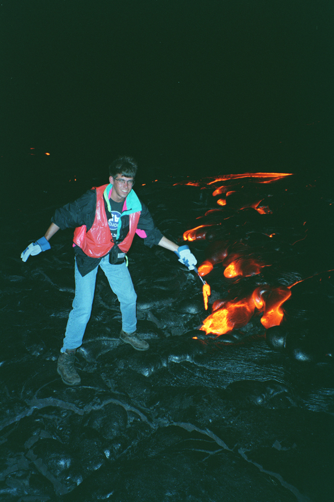 Mike Poland sampling lava