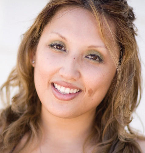 Portrait photo of UC Davis alumna Raquelmarie Clark