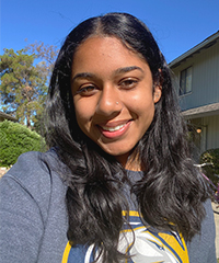 Shreya Nene, student with black hair and wearing UC Davis shirt