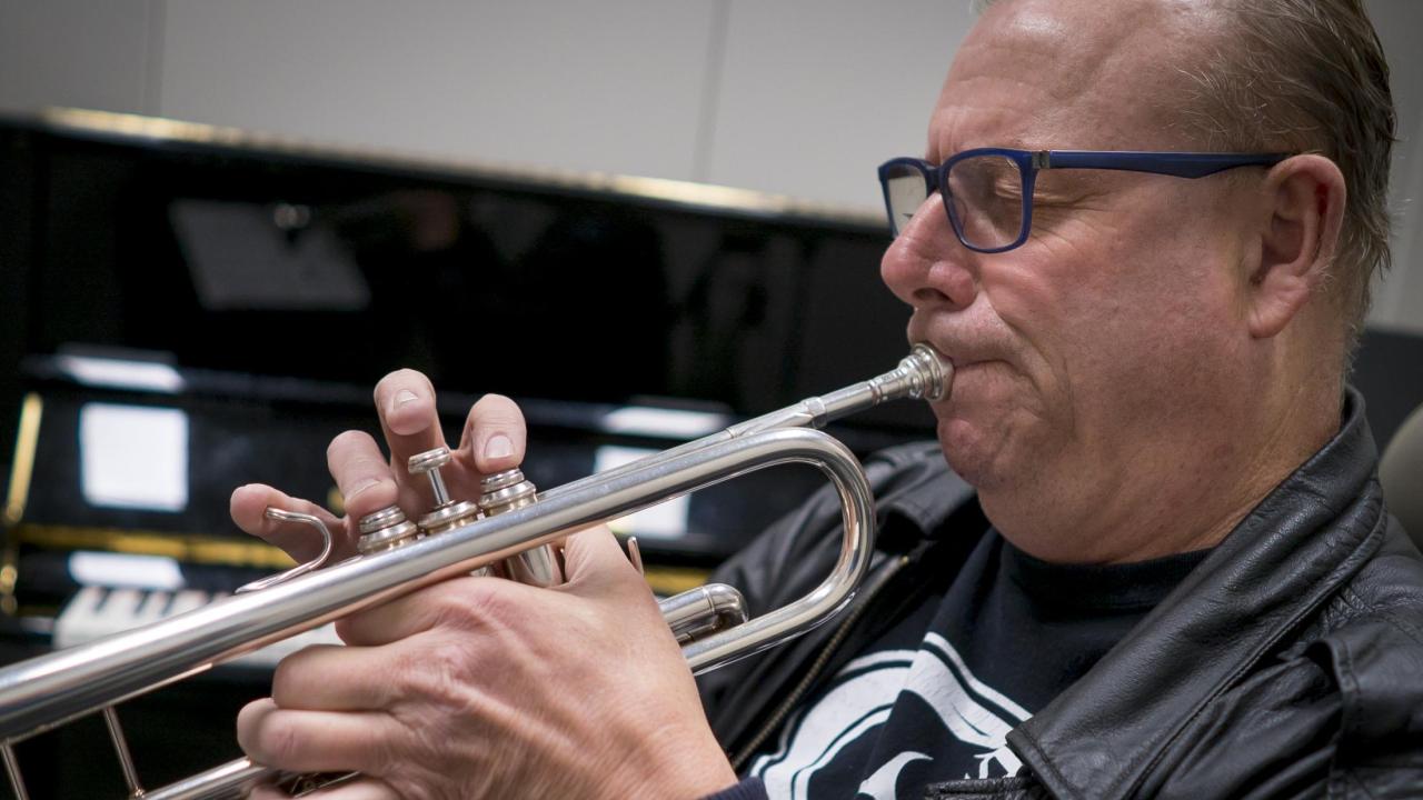 In celebration of the education that has helped him return to playing music, Michael O’Hearn plans to leave his wheelchair behind as he crosses the stage at UC Davis’ fall commencement. (Joe Proudman/UC Davis) Michael O'Hearn