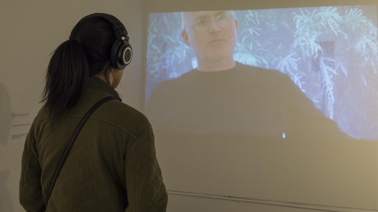 Student watching a video that's part of current exhibition. Photos by Beijo Lee. basement galery
