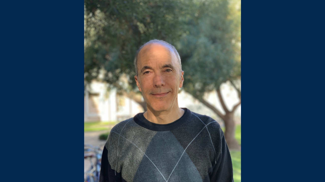 Portrait photo of Professor Mark Mascal, UC Davis Department of Chemistry, standing outside.