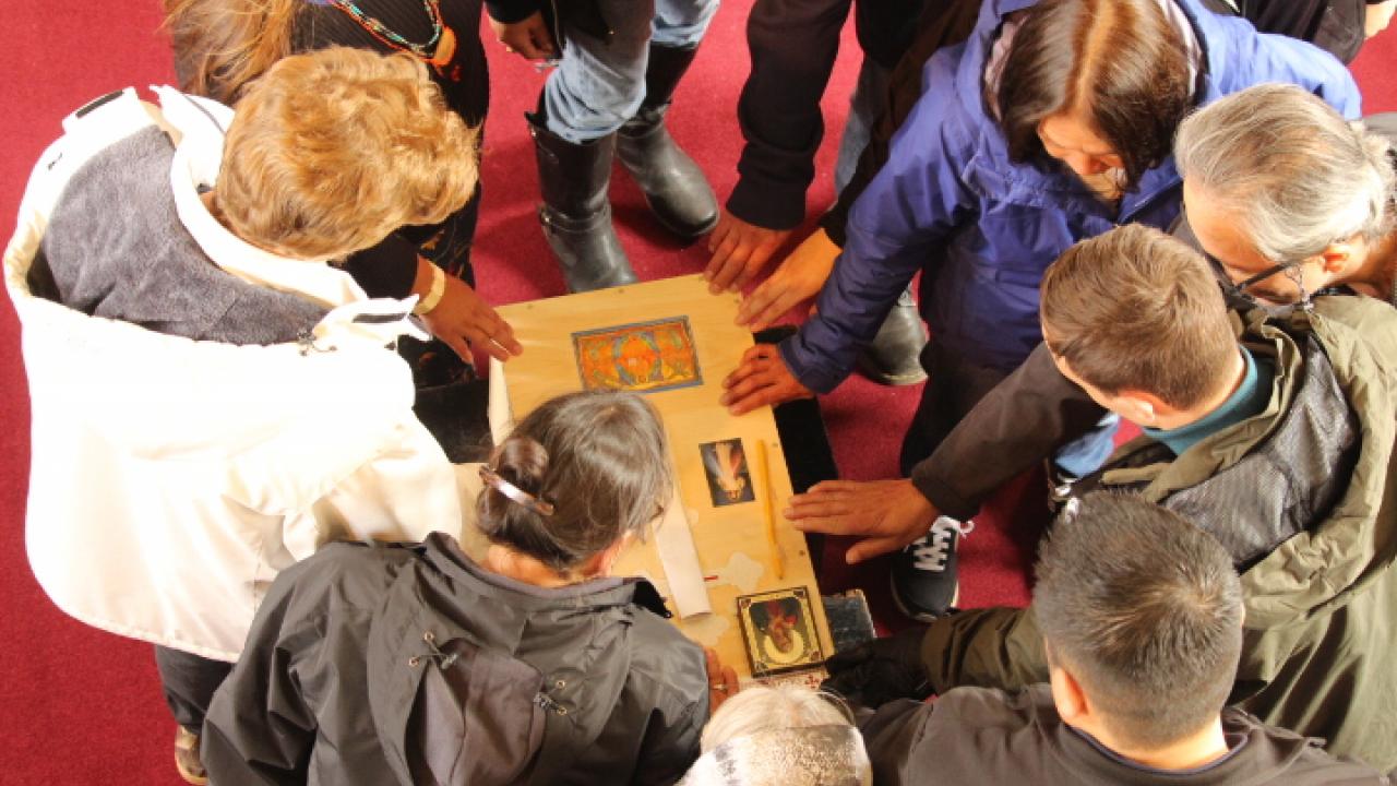 Group gathered around the casket of Sophia Tetoff