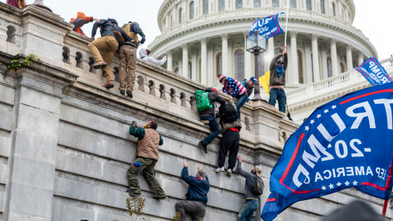 Protesters scaling wall of U.S. Capitol
