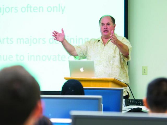Tim McCarthy talks with students in the Data Studies Program