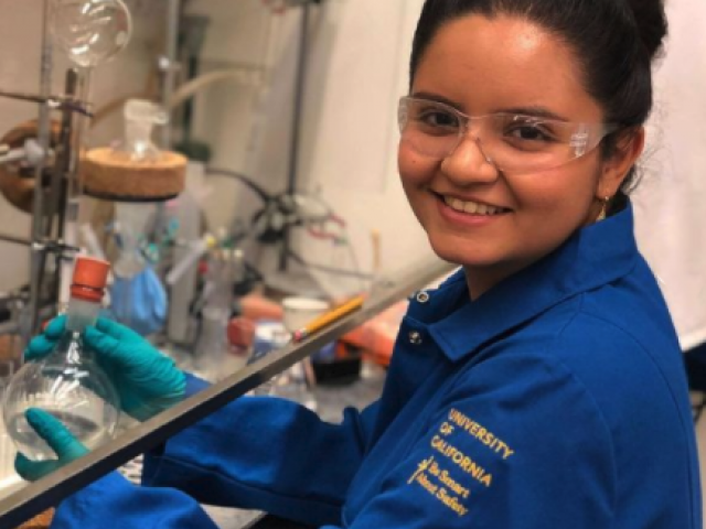 Magda Tellez, UC Davis undergraduate in pharmaceutical chemistry, pictured in a chemistry lab.