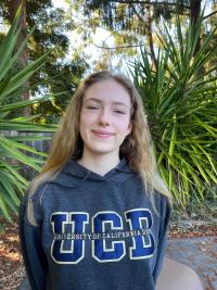 Annabel Marshall, blonde haired female student wearing UC Davis sweatshirt