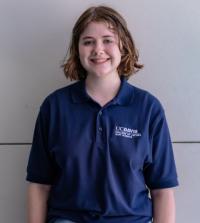 Bayleigh Baldwin, female student wearing L&S blue polo