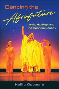 Dancing the Afrofuture book cover with three female dancers on stage, center woman has arms raised in flowing golden garb and is singing