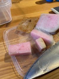pink colored meat and knife