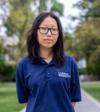 Kay Xiong, wearing UC Davis blue L&S shirt