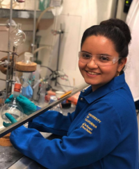 Magda Tellez, UC Davis undergraduate in pharmaceutical chemistry, pictured in a chemistry lab.