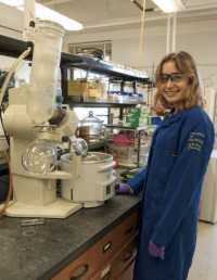 Mira Milic, UC Davis undergraduate in pharmaceutical chemistry, pictured in a chemistry lab.