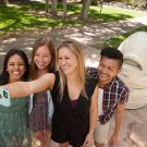 These students from the College of Letters and Science include, from left, Cindy Suzuki, a design major; Hailey Jenkins, a communication major; Lindsey O’Tousa, a psychology major; and Miguel Bagsit, a communication major. They posed at a popular selfie site with the “Eye on Mrak (Fatal Laff)” Egghead. (Gregory Urquiaga/UC Davis)