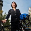 Alumna Sydney Vergis, a double major in economics and environmental policy, analysis and planning, often rides her bike from Davis to Sacramento where she is the acting legislative director for the California Air Resources Board. (Karin Higgins/UC Davis)