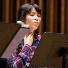 picture of Mira Huang at music stand singing UC Davis