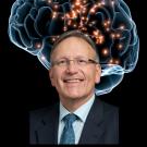 Portrait photo of UC Davis cognitive neuroscientist Ron Mangun with image of brain behind him.