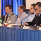 Photo: panelists at conference