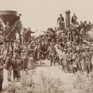 historic photo of last spike ceremony for transcontinental railroad