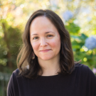 image of woman with light skin and medium dark hair taken outdoors