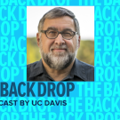 Portrait photo of bearded man over background with words "The Backdrop: A Podcast by UC Davis"