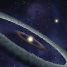 This artist conception shows a binary-star, or two-star, system, called HD 113766, where astronomers suspect a rocky Earth-like planet is forming around one of the stars.